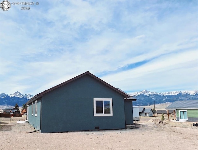 138 Jerry Dr, Westcliffe, CO 81252 - view of property exterior featuring stucco siding and a mountain view