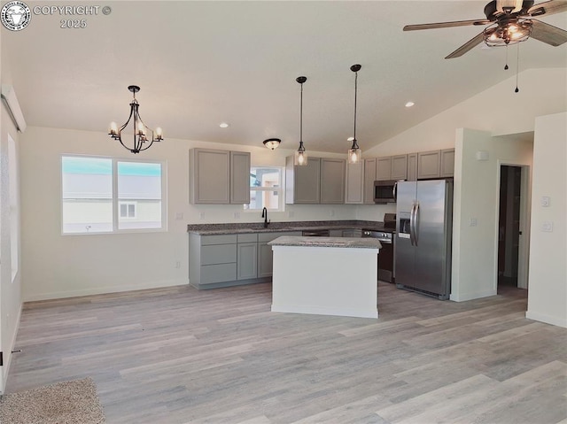 138 Jerry Dr, Westcliffe, CO 81252 - kitchen with gray cabinetry, light wood-style floors, appliances with stainless steel finishes, and a sink