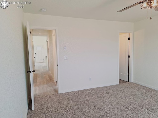 138 Jerry Dr, Westcliffe, CO 81252 - unfurnished room featuring baseboards, a ceiling fan, and light colored carpet