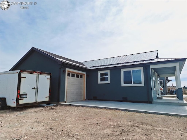 138 Jerry Dr, Westcliffe, CO 81252 - exterior space featuring driveway, metal roof, a garage, and crawl space