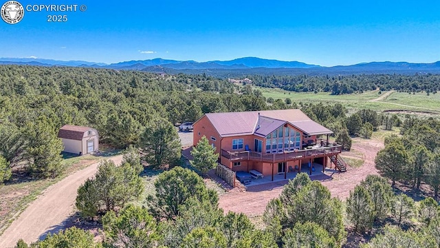 2680 Wild Bill Blvd, Westcliffe, CO 81252 - aerial view of property and surrounding area featuring a heavily wooded area and a mountain backdrop