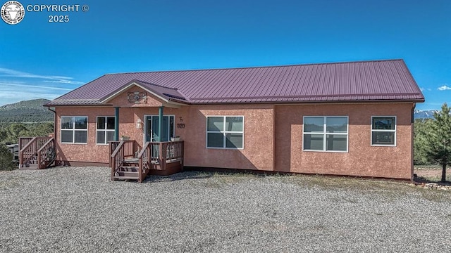 2680 Wild Bill Blvd, Westcliffe, CO 81252 - view of front facade with stucco siding and a metal roof