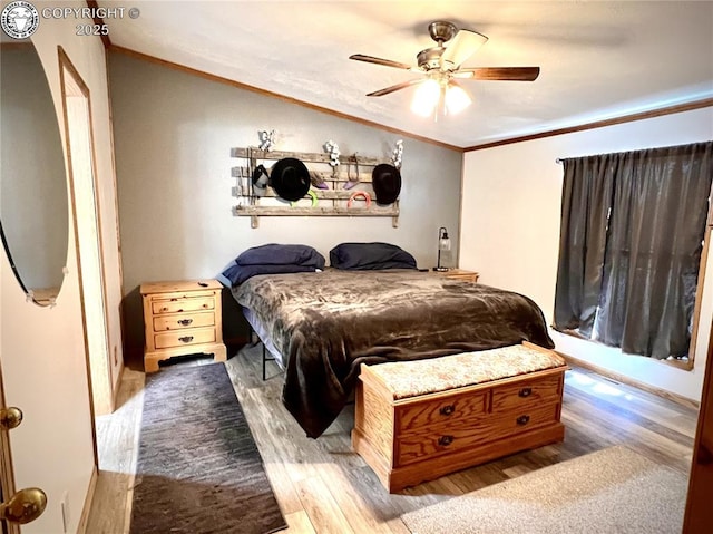 925 C St, Penrose, CO 81240 - bedroom featuring wood finished floors, a ceiling fan, ornamental molding, and lofted ceiling