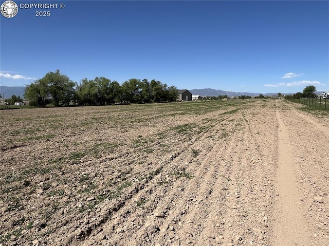 925 C St, Penrose, CO 81240 - view of yard featuring a view of rural / pastoral area and a mountain view