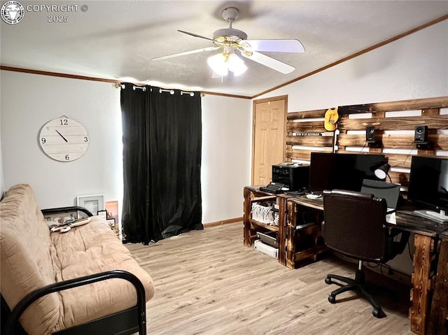925 C St, Penrose, CO 81240 - office area featuring ornamental molding, a ceiling fan, lofted ceiling, and wood finished floors