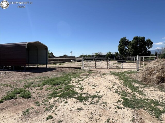 925 C St, Penrose, CO 81240 - view of yard featuring a view of rural / pastoral area
