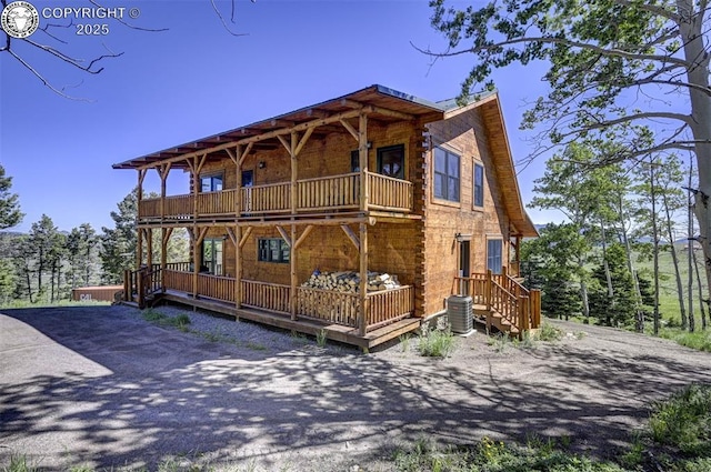 540 County Road 356, Westcliffe, CO 81252 - view of front facade featuring a balcony and cooling unit