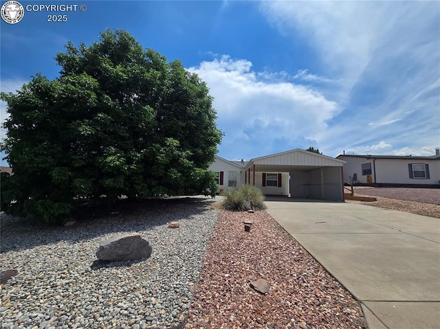213 Indian Hills Rd, Florence, CO 81226 - view of front of property with driveway and a carport