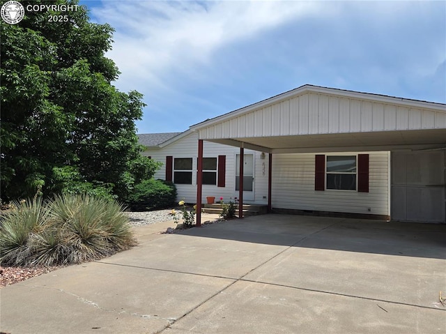 213 Indian Hills Rd, Florence, CO 81226 - manufactured / mobile home featuring concrete driveway and an attached carport