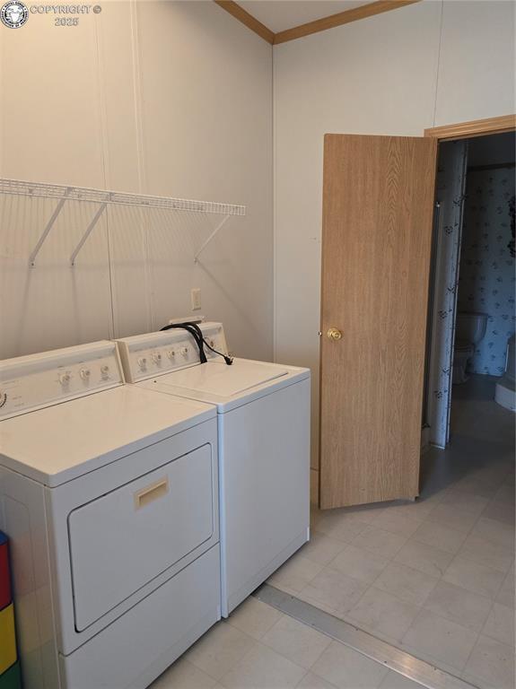 213 Indian Hills Rd, Florence, CO 81226 - laundry room featuring washer and dryer