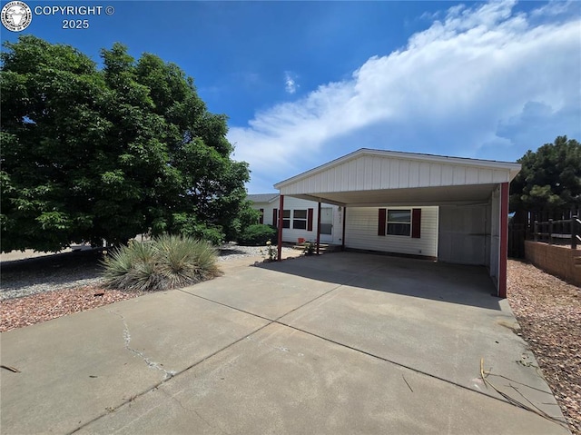 213 Indian Hills Rd, Florence, CO 81226 - manufactured / mobile home with driveway and a carport