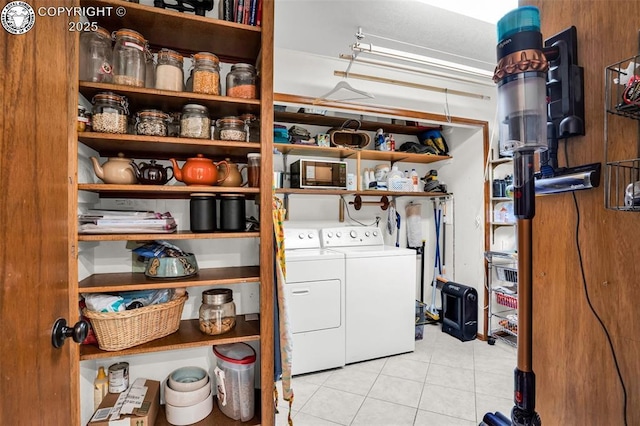 1124 Grand Ave, Canon City, CO 81212 - washroom with washer and clothes dryer and tile patterned flooring