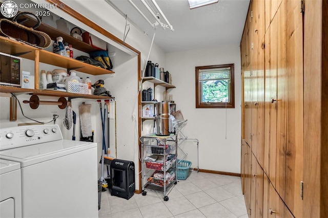 1124 Grand Ave, Canon City, CO 81212 - laundry area featuring washer and dryer and light tile patterned floors