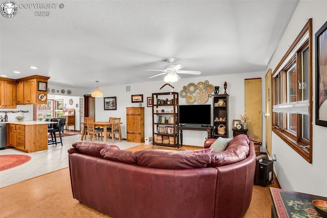 1124 Grand Ave, Canon City, CO 81212 - living area with a ceiling fan, recessed lighting, and light tile patterned floors