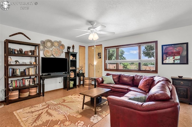 1124 Grand Ave, Canon City, CO 81212 - living area with a ceiling fan and a textured ceiling