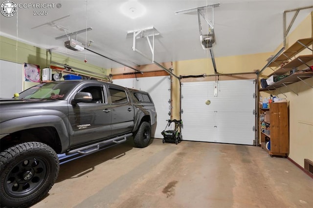 1124 Grand Ave, Canon City, CO 81212 - garage featuring a garage door opener