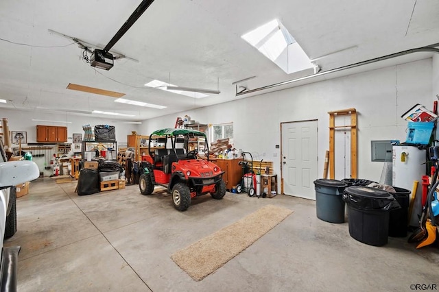 garage with a garage door opener and water heater