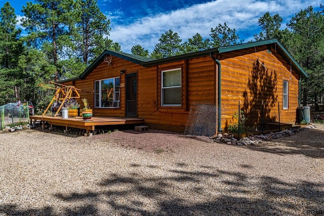 view of home's exterior with a deck