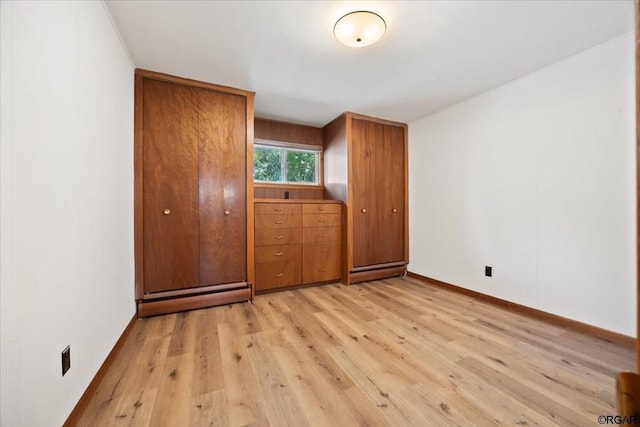 unfurnished bedroom featuring light hardwood / wood-style flooring