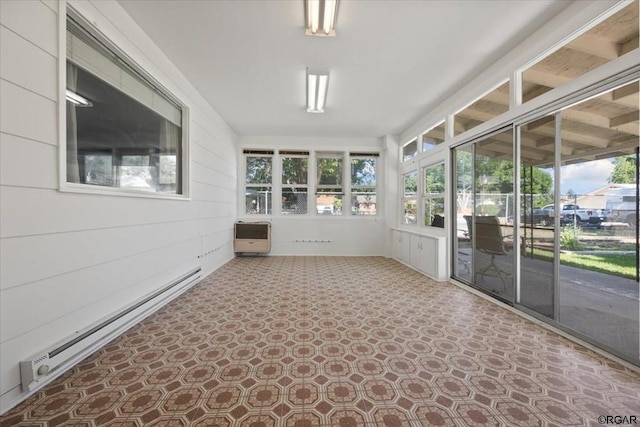 unfurnished sunroom featuring a baseboard radiator and heating unit