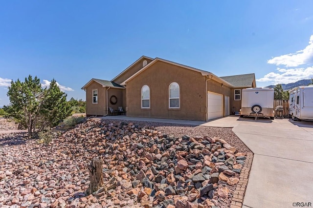 view of front of home with a garage