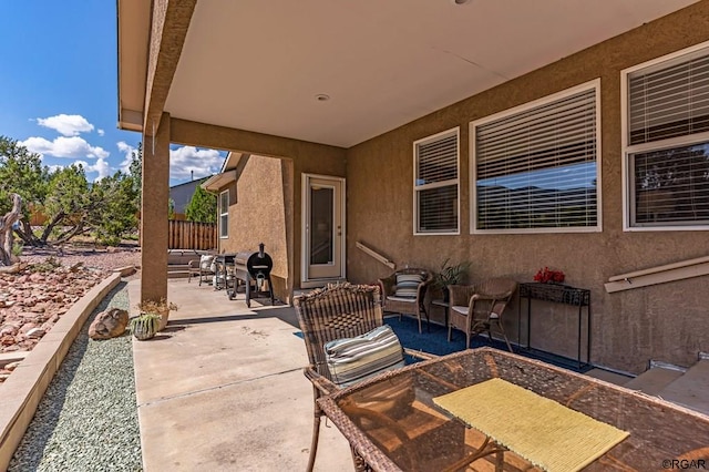 view of patio with a grill