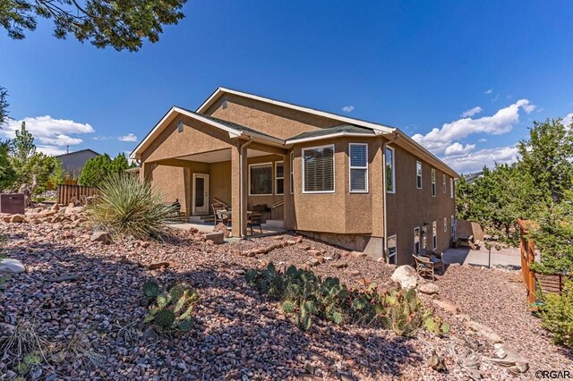 view of front of home with a patio