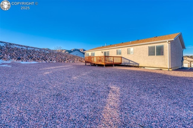 exterior space with a wooden deck