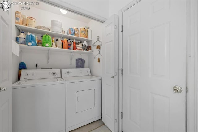 washroom with washer and clothes dryer