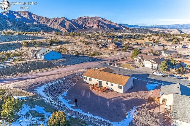 aerial view featuring a mountain view