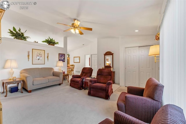 carpeted living room featuring lofted ceiling and ceiling fan