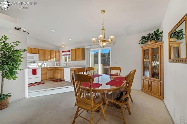 dining area featuring sink, vaulted ceiling, light carpet, and a notable chandelier