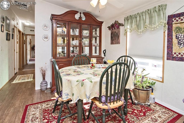 510 N 19th St Unit 1, Canon City, CO 81212 - dining room featuring a ceiling fan, wood finished floors, and ornamental molding