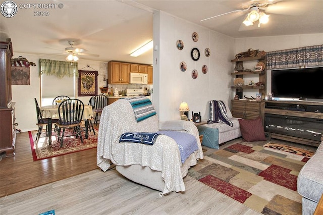 510 N 19th St Unit 1, Canon City, CO 81212 - living room with a ceiling fan and wood finished floors