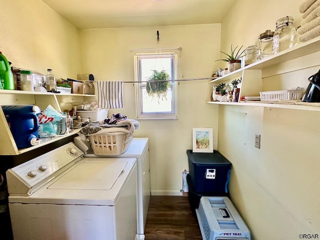 clothes washing area with separate washer and dryer and hardwood / wood-style floors