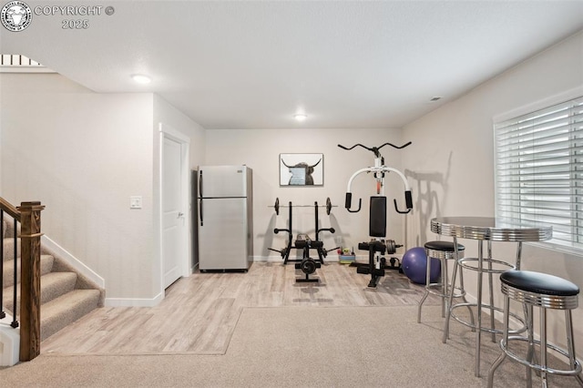 16840 New Autumn Dr, Monument, CO 80132 - workout area with wood finished floors and baseboards