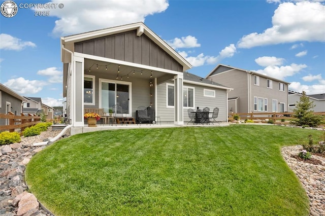 16840 New Autumn Dr, Monument, CO 80132 - rear view of property featuring board and batten siding and a patio area