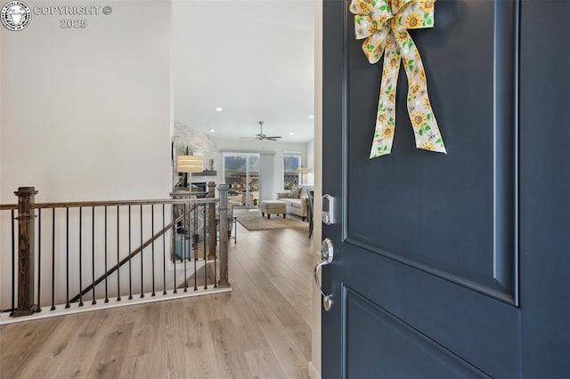 16840 New Autumn Dr, Monument, CO 80132 - entrance foyer with wood finished floors, a ceiling fan, and recessed lighting