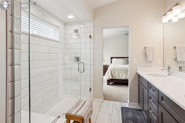 16840 New Autumn Dr, Monument, CO 80132 - full bath with ensuite bathroom, a stall shower, double vanity, and baseboards