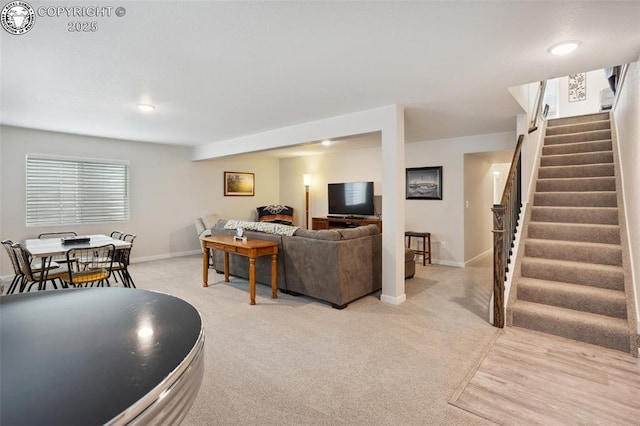 16840 New Autumn Dr, Monument, CO 80132 - living room with stairs, light carpet, baseboards, and recessed lighting