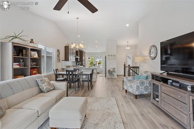 16840 New Autumn Dr, Monument, CO 80132 - living area featuring ceiling fan, a chandelier, light wood-style flooring, vaulted ceiling, and recessed lighting