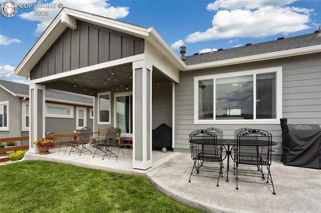 16840 New Autumn Dr, Monument, CO 80132 - back of property with a patio, board and batten siding, and a yard