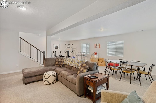 16840 New Autumn Dr, Monument, CO 80132 - living area with light carpet, stairway, baseboards, and recessed lighting