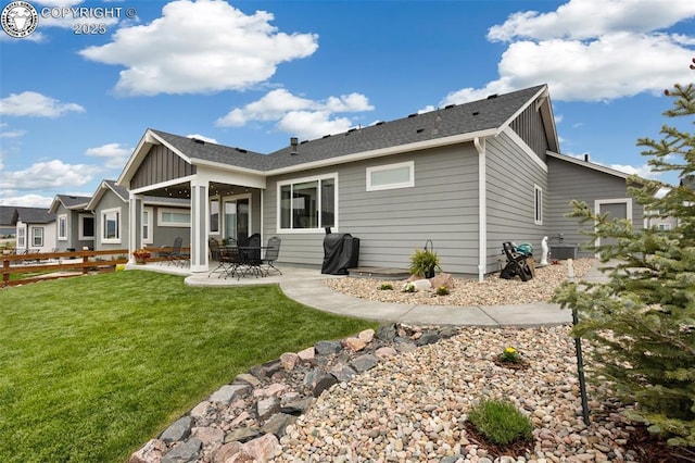 16840 New Autumn Dr, Monument, CO 80132 - rear view of house featuring a patio area, board and batten siding, and central AC unit