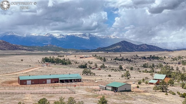property view of mountains with a rural view