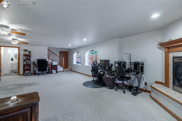 46 Wild Rose Dr, Canon City, CO 81212 - misc room featuring carpet flooring, a tiled fireplace, a desk, ceiling fan, and recessed lighting