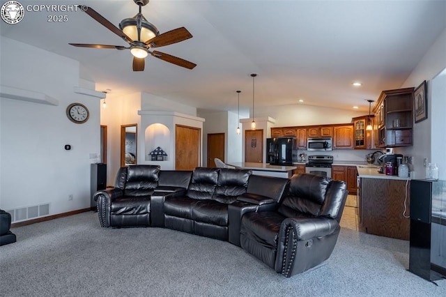46 Wild Rose Dr, Canon City, CO 81212 - living room featuring ceiling fan, vaulted ceiling, light carpet, and recessed lighting