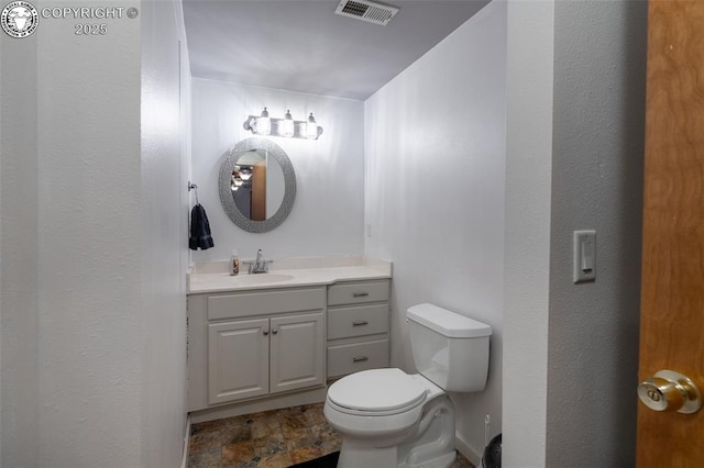 46 Wild Rose Dr, Canon City, CO 81212 - bathroom featuring vanity and stone finish floors