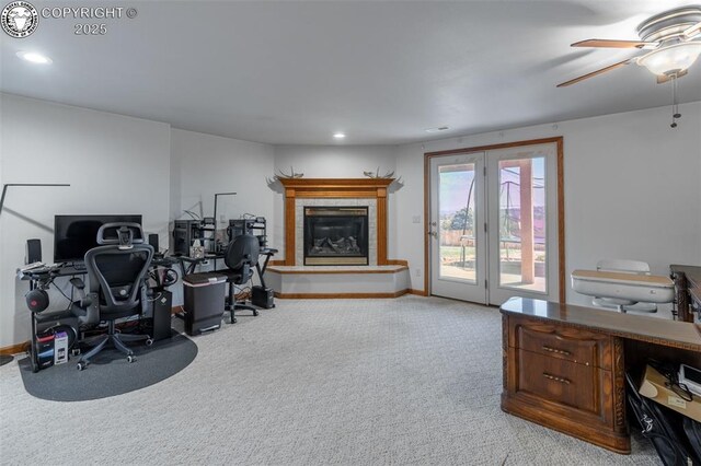 46 Wild Rose Dr, Canon City, CO 81212 - office featuring light colored carpet, a tiled fireplace, a ceiling fan, and recessed lighting