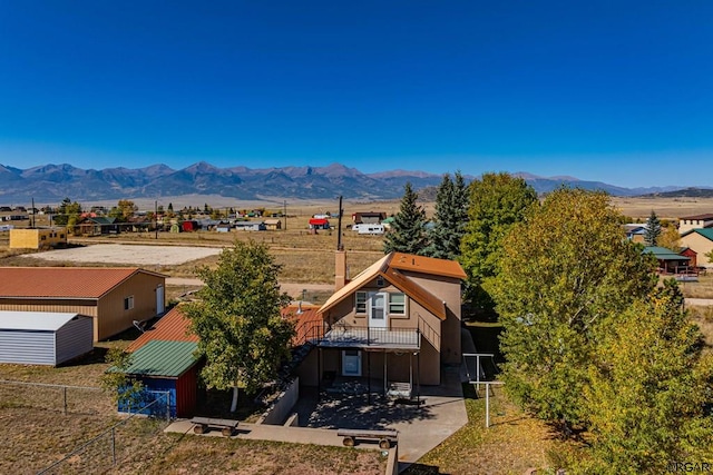 drone / aerial view featuring a mountain view